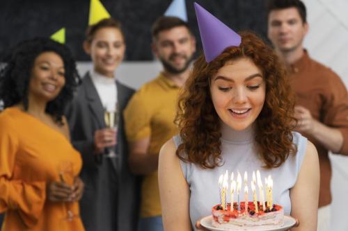 front-view-smiley-woman-holding-cake